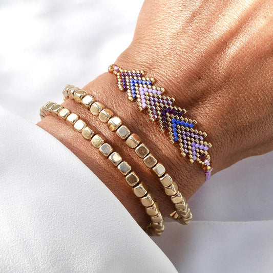 Set Purple Glow – deux bracelets dorés et un chevron coloré
