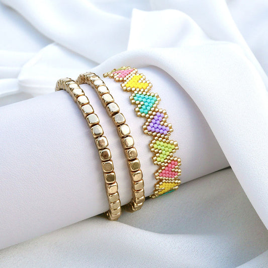 Set de bracelets Candy Mood en hématite dorée avec chevron pastel rose, turquoise, lilas et jaune – bijoux femme bohème