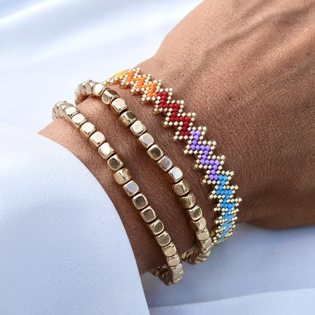 Trio de bracelets Rainbow Mood en hématite dorée et chevron multicolore